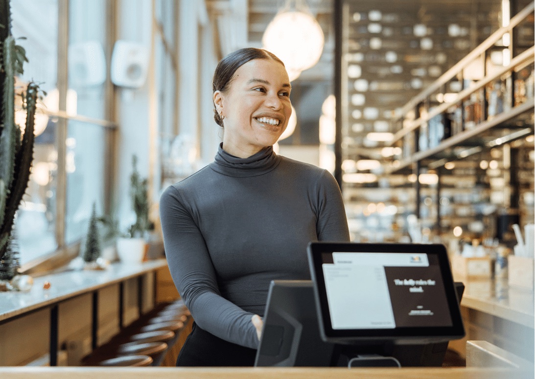 Restolutions kasseløsning i bruk ved en restaurantdisk